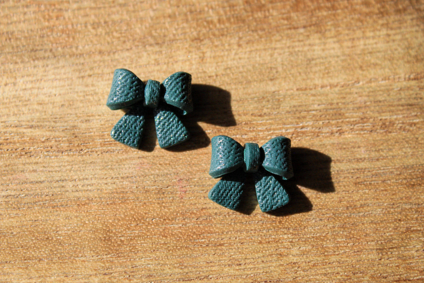 Mini Emerald Bow Studs